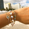 White Glass Bead Evil Eye Bracelet in Rainbow Iris